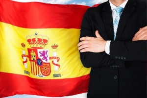 36179303 - close-up of businessman in front of spanish flag